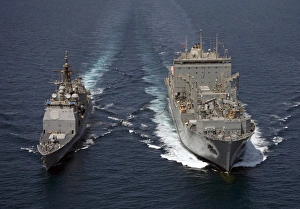 USS Cape St. George pulls alongside USNS Charles Drew for a replenishment at sea USS Cape St. George pulls alongside USNS Charles Drew for a replenishment at sea