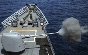USS Philippine Sea fires its MK 45 5-inch lightweight gun USS Philippine Sea fires its MK 45 5-inch lightweight gun