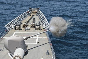 USS Philippine Sea fires its Mk-45 lightweight gun USS Philippine Sea fires its Mk-45 lightweight gun