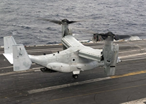 A V-22 Osprey lands aboard the aircraft carrier USS Harry S. Truman A V-22 Osprey lands aboard the aircraft carrier USS Harry S. Truman
