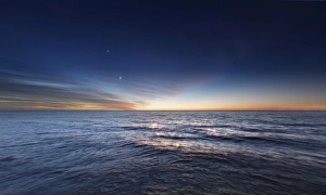Venus and Jupiter in conjunction before sunrise over Rio de la Plata, Argentina Venus and Jupiter in conjunction before sunrise over Rio de la Plata, Argentina
