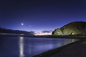 Venus and Jupiter dance in the evening twilight over Lake Namtso, Tibet, China Venus and Jupiter dance in the evening twilight over Lake Namtso, Tibet, China