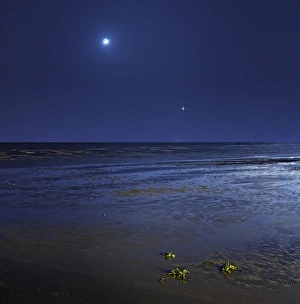 Venus shines brightly below the crescent Moon from coast of Buenos Aires, Argentina Venus shines brightly below the crescent Moon from coast of Buenos Aires, Argentina