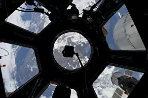 Images Dated 29th December 2011: View of Earth through the Cupola on the International Space Station