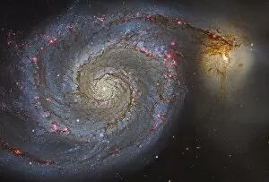 Colliding Gallery: The Whirlpool Galaxy and its companion galaxy