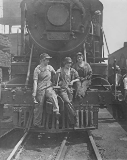 Women laborers seated on front of engine at Bush Terminal railroad yard, 1918 Women laborers seated on front of engine at Bush Terminal railroad yard, 1918