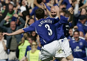 <b class=qtipBold><figcaption>Andy Johnson</figcaption></b><br>AJ is congratulated by Gary Naysmith.<br><em>© Everton</em> Andy Johnson