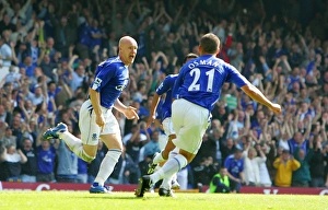 <b class=qtipBold><figcaption>Andy Johnson and Leon Osman</figcaption></b><br>AJ and Ossie celebrate Everton's second goal.<br><em>© Everton</em> Andy Johnson and Leon Osman