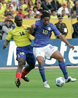 Images Dated 29th March 2009: Ecuadors Castillo fights for the ball Brazils Ronaldinho during their World Cup qualifier soccer