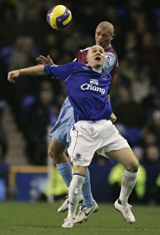 Evertons Johnson challenges West Ham Uniteds Konchesky for the ball during their English Evertons Johnson challenges West Ham Uniteds Konchesky for the ball during their English
