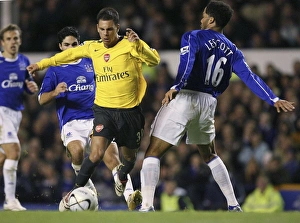 Evertons Lescott challenges Arsenals Aliadiere for the ball during their English League Evertons Lescott challenges Arsenals Aliadiere for the ball during their English League