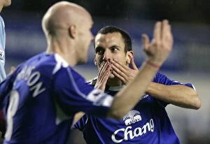 Images Dated 3rd December 2006: Evertons Osman celebrates with Johnson after scoring during their English Premier League soccer mat