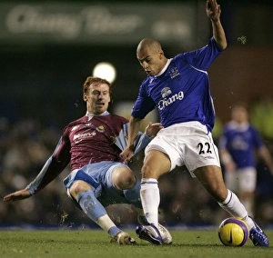 Evertons Vaughan challenges West Ham Uniteds Collins for the ball during their English Evertons Vaughan challenges West Ham Uniteds Collins for the ball during their English