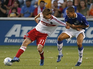 <b class=qtipBold><figcaption>Image of Week</figcaption></b><br>Chicago Fire Chris Rolfe (L) battles Everton FC Jack Rodwell for the ball during the first half of their international friendly soccer match in Bridgview, Illinois July 30, 2008. REUTERS/John Gress (UNITED STATES) Picture Supplied by Action Images 2008-07-31T025144Z_01_JRG105_RTRIDSP_3_SOCCER.jpg<br><em>© Everton FC - All Rights Reserved</em> Image of Week