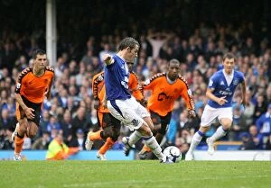 Images Dated 30th August 2009: Leighton Baines Scores Penalty: Everton's Second Goal Against Wigan Athletic (BPL)
