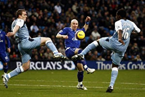 Manchester City v Everton Andrew Johnson is challenged by Nedum Onuoha and Richard Dunne Manchester City v Everton Andrew Johnson is challenged by Nedum Onuoha and Richard Dunne