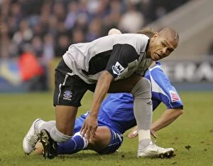 Images Dated 7th January 2006: Marcus Bent Foul: Everton Football Club's Star Forced to the Ground
