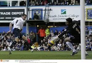 Images Dated 9th December 2006: Portsmouth v Everton Portsmouths David James saves from Evertons James Beattie