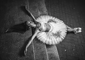 Ballerina lying on the stairs 2 BW