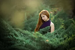 Images Dated 24th August 2019: Redhead in green