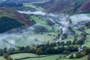 Autumn mist in Dee Valley (Dyffryn Dyfrdwy) near Llangollen, Denbighshire, Wales, UK Autumn mist in Dee Valley (Dyffryn Dyfrdwy) near Llangollen, Denbighshire, Wales, UK