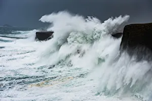 Big storm hitting cliffs, with waves breaking over the top, Shetland, Scotland, UK, July Big storm hitting cliffs, with waves breaking over the top, Shetland, Scotland, UK, July