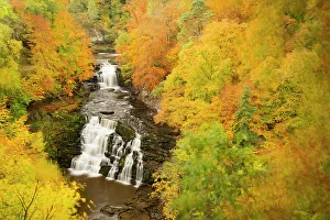 Corra Linn waterfall at Falls of Clyde in late autumn, Lanarkshire, Scotland, UK Corra Linn waterfall at Falls of Clyde in late autumn, Lanarkshire, Scotland, UK