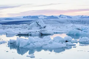 End of the Vatnajokull glacier melting into Jokulsarlon glacial lake, Iceland, July 2012 End of the Vatnajokull glacier melting into Jokulsarlon glacial lake, Iceland, July 2012
