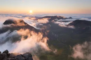 Evening view from Askival mountain over inversion layer and the Atlantic corrie Evening view from Askival mountain over inversion layer and the Atlantic corrie