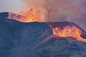 Fagradalsfjall Volcano erupting with lava overflowing to lava fields Fagradalsfjall Volcano erupting with lava overflowing to lava fields