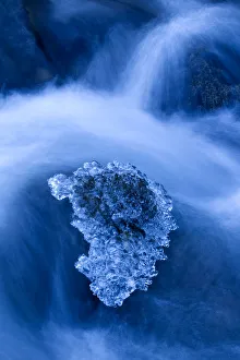 Ice in flowing river water. Scotland, UK, February Ice in flowing river water. Scotland, UK, February