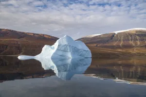 Iceberg and reflection, in Rode Fjord (Red Fjord), Scoresby Sund, Greenland, August Iceberg and reflection, in Rode Fjord (Red Fjord), Scoresby Sund, Greenland, August