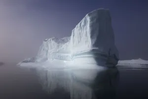 Iceberg in the sea outside the Kangia Ilulissat Icefjord. Iceberg from the Sermeg Kujalleg Glacier Iceberg in the sea outside the Kangia Ilulissat Icefjord. Iceberg from the Sermeg Kujalleg Glacier