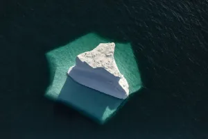 Iceberg showing submerged section when viewed from above, Greenland's National Park, Northeast Greenland Iceberg showing submerged section when viewed from above, Greenland's National Park, Northeast Greenland