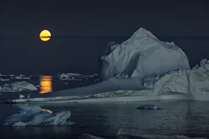 Icebergs and a full moon, Thule, North Greenland. September 2019 Icebergs and a full moon, Thule, North Greenland. September 2019