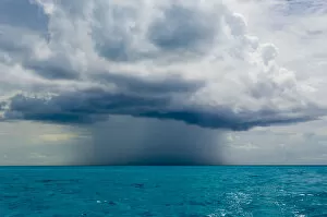 Images Dated 20th August 2006: Isolated rain storm above the sea. Bahamas Sea, Bahamas, North America, August 2006