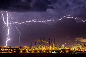 Lightning strike over South Africa's largest coal processing plant. Sasol, Mpumalanga, South Africa, November, 2016 Lightning strike over South Africa's largest coal processing plant. Sasol, Mpumalanga, South Africa, November, 2016