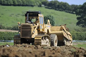 Machine creating earth embankment for lagoon at Rutland Water. Summer 2010 Machine creating earth embankment for lagoon at Rutland Water. Summer 2010