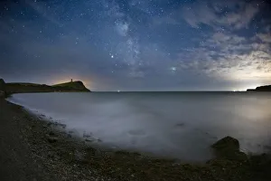 The Milky Way with Saturn and Jupiter in the night sky over Kimmeridge Bay The Milky Way with Saturn and Jupiter in the night sky over Kimmeridge Bay