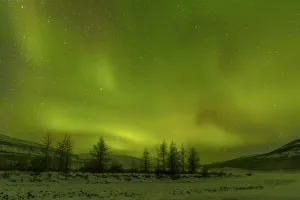 Northern lights over Putoransky State Nature Reserve, Putorana Plateau, Siberia, Russia Northern lights over Putoransky State Nature Reserve, Putorana Plateau, Siberia, Russia