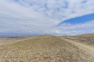Expansive Gallery: Two people walking in vast landscape with dry grass Barguzin Valley, Buryatial, Siberia