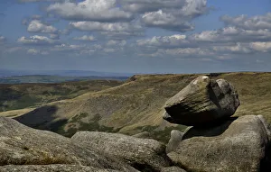 Perched boulder of Carboniferous age Millstone Grit on the western edge of the Kinder Perched boulder of Carboniferous age Millstone Grit on the western edge of the Kinder