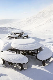 Images Dated 18th January 2016: Picnic tables on the summit of Kirkstone Pass, plastered in fresh snow after overnight