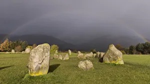 Rainbow and dark skies above Castlerigg Stone Circle, Lake District National Park Rainbow and dark skies above Castlerigg Stone Circle, Lake District National Park