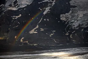 Rainbow in the Pasterze Glacial Valley, Grossglockner Mountain, Hohe Tauern National Park Rainbow in the Pasterze Glacial Valley, Grossglockner Mountain, Hohe Tauern National Park