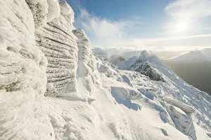 Rime ice forms on Torridonian Sandstone that forms An Teallach. Ullapool, Highlands of Scotland Rime ice forms on Torridonian Sandstone that forms An Teallach. Ullapool, Highlands of Scotland