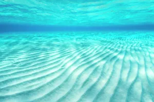 Ripples of sand on a shallow seabed. East End, Grand Cayman, Cayman Islands Ripples of sand on a shallow seabed. East End, Grand Cayman, Cayman Islands