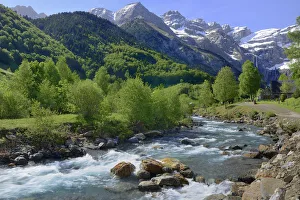 River Gave de Gavarnie with Cirque du Gavarnie in the distance, Pyrenees National Park River Gave de Gavarnie with Cirque du Gavarnie in the distance, Pyrenees National Park