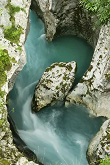 River Soca flowing through Velika korita showing erosion, Triglav National Park, Slovenia River Soca flowing through Velika korita showing erosion, Triglav National Park, Slovenia