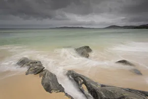 Rocks on Seilebost beach with storm approaching, North Harris, Outer Hebrides, Scotland Rocks on Seilebost beach with storm approaching, North Harris, Outer Hebrides, Scotland